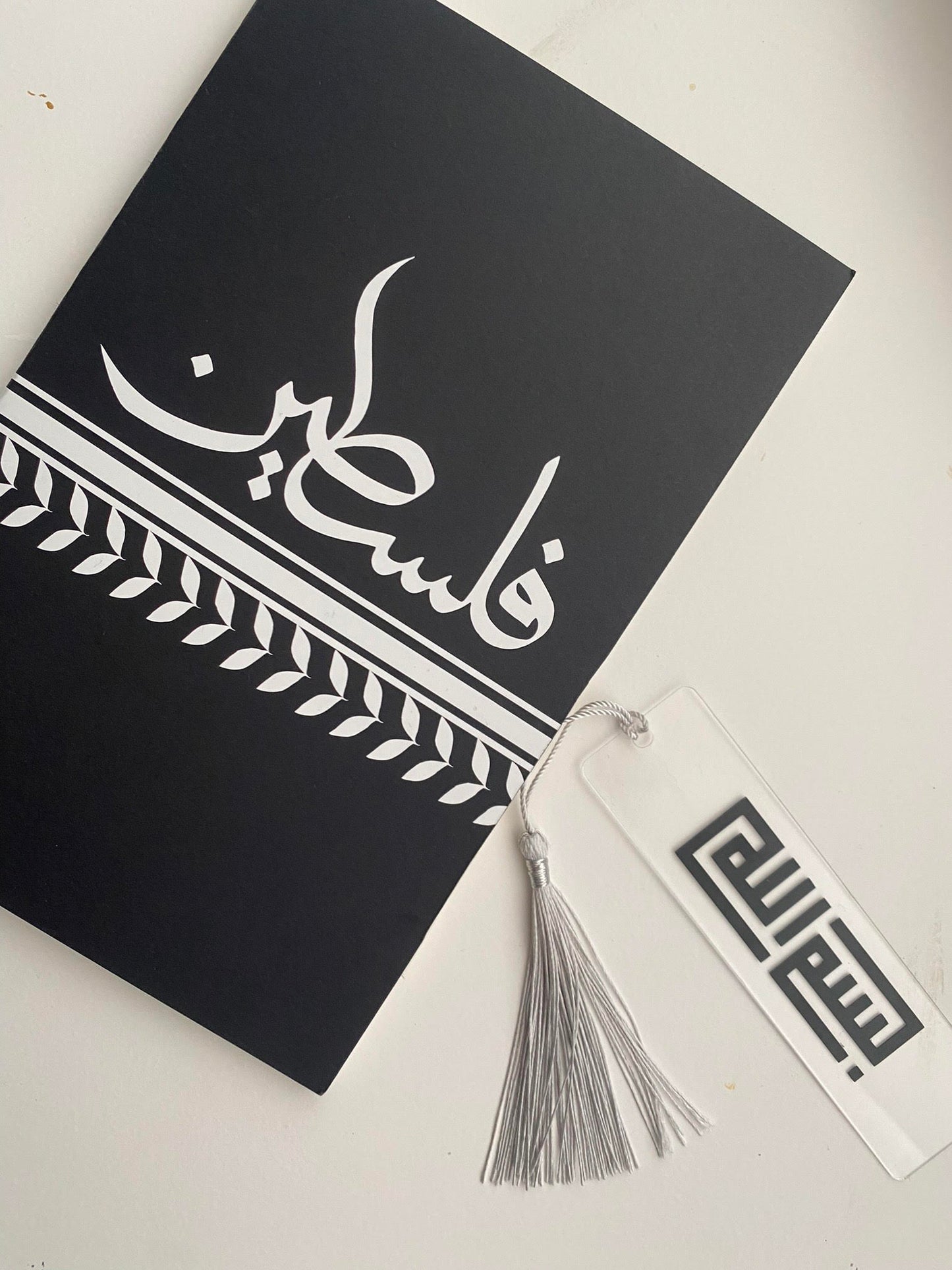 "Falestine" lined notebook and "Bismillah" bookmark